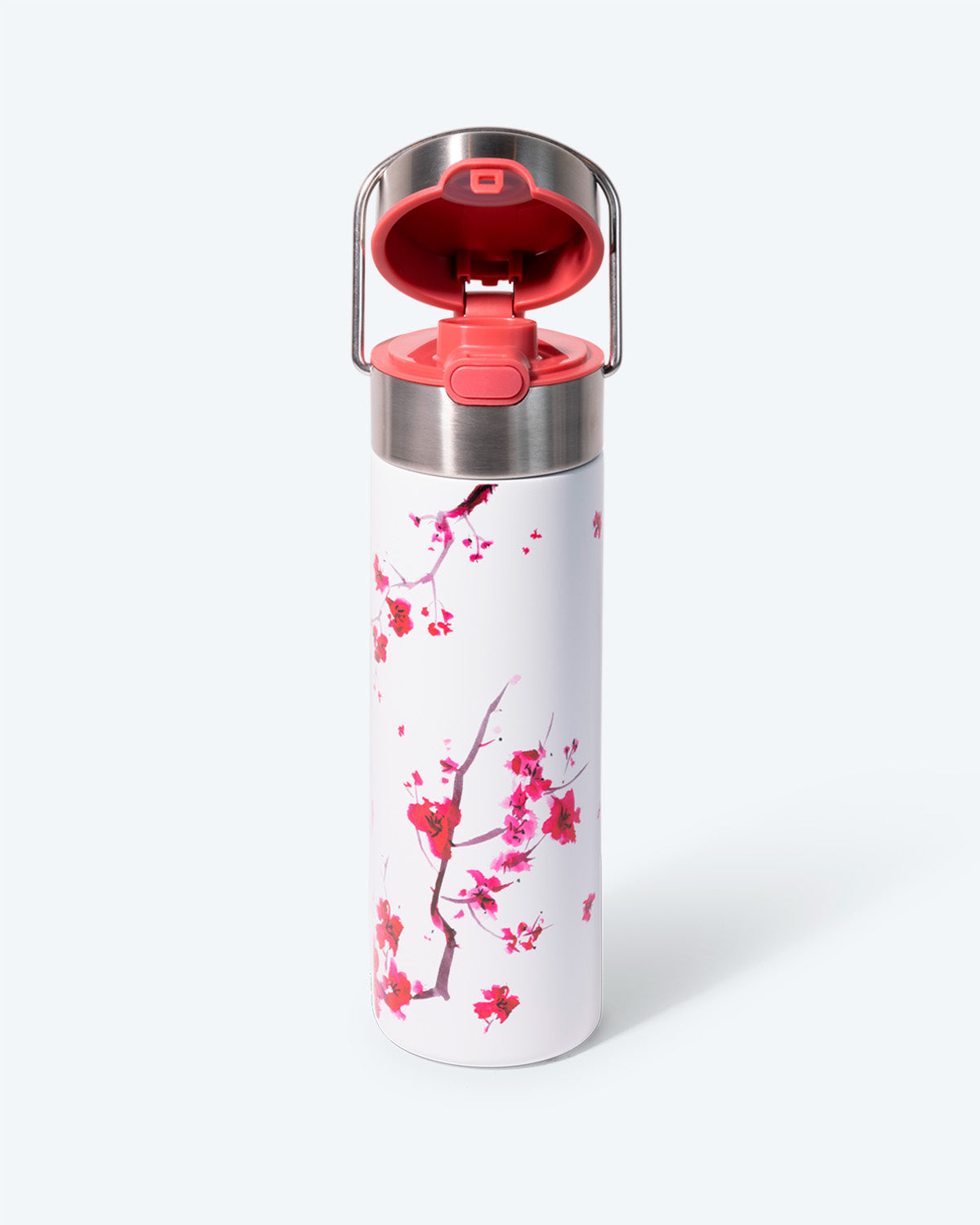 Handsome metal thermos, white with pink cherry leaf design, and built-in strainer for making and taking loose-leaf tea on the go.