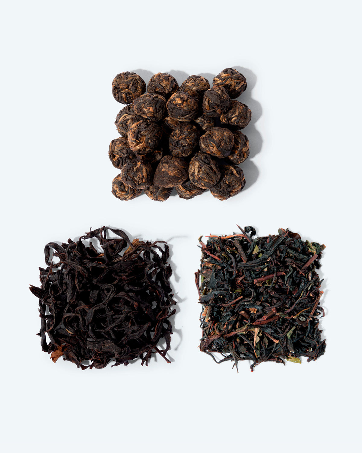 Three delicious black teas. Large black jasmine pearls from China, vibrant Nilgiri Frost from India, and rich Koucha Sakura from Japan.