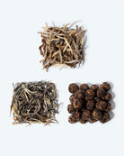 Three special Chinese teas. Jasmine silver needle, young white buds scented with jasmine flowers, black jasmine pearls featuring mellow leaves tipped with orange and also scented with jasmine, and fine yellow tea, soft in color.