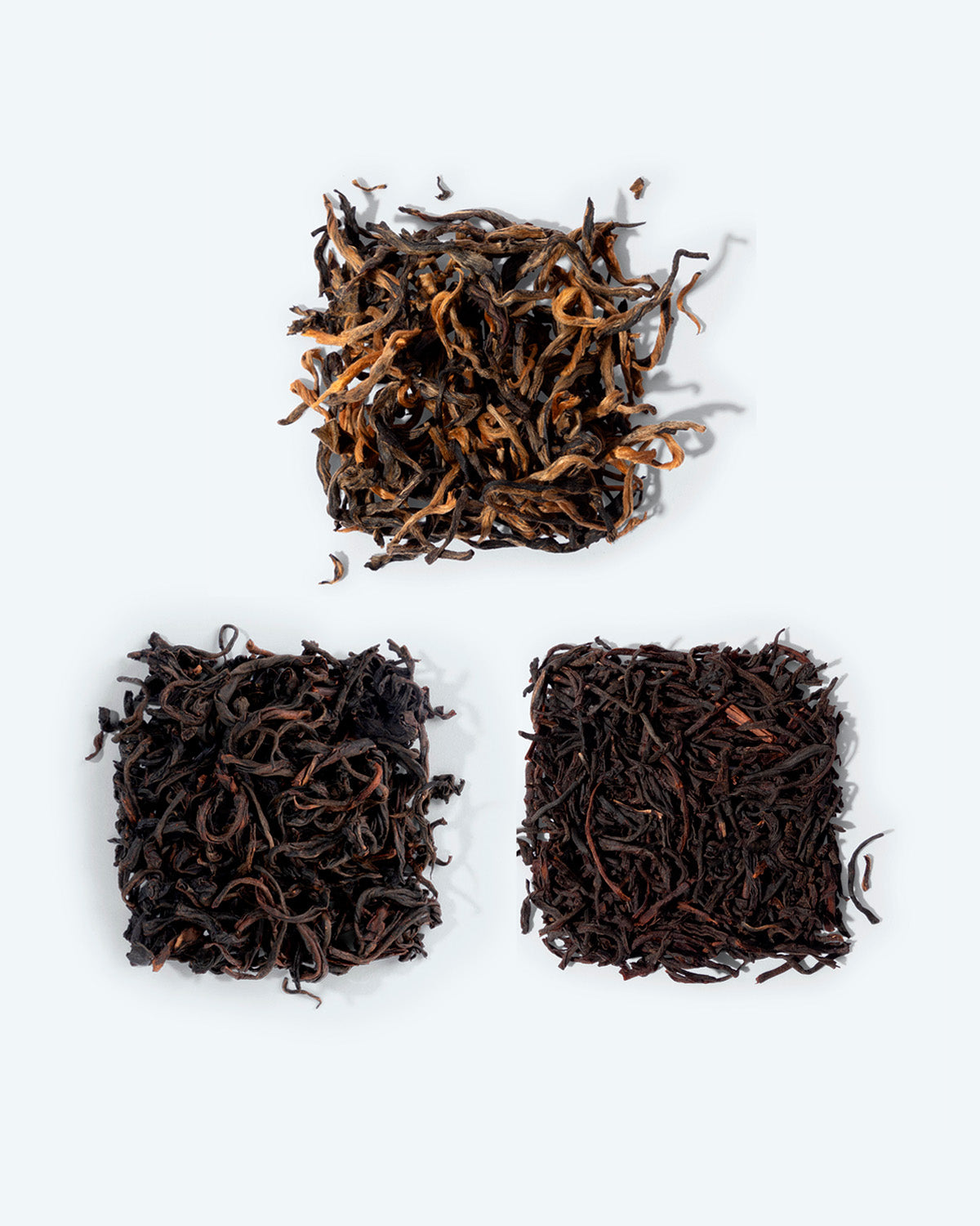 Three delicious black tea. Gorgeous Yunnan Dianhong from China, dark with apricot-colored tips, robust Rukeri from Rwanda, and rich Nigiri Smooth from India.
