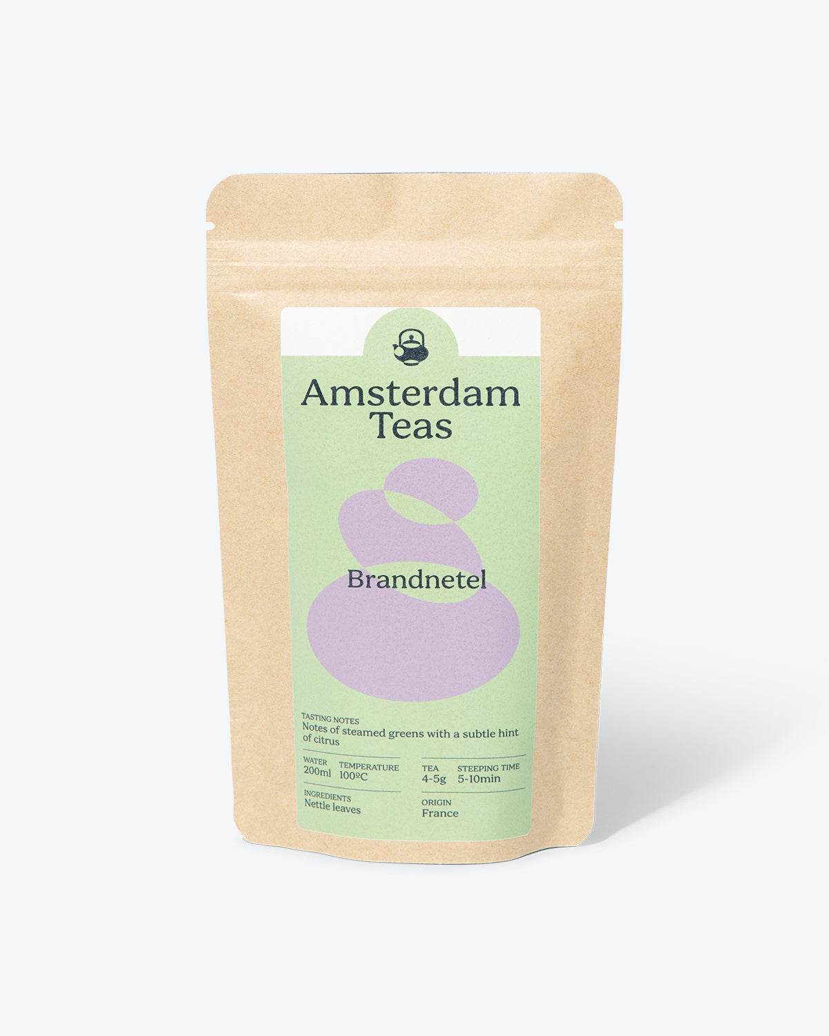 Our attractive packaging for Brandnetel tea, with a label with interlocking light purple ovals on a light green field, including tasting notes, origin and preparation instructions, on a brown kraft paper bag with zip lock.